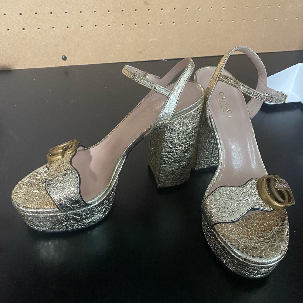 Size 34 authentic Gucci heels . Thick heel never worn no tag or receipt